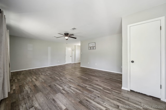9553 W 71st St S, Tulsa, OK 74131 - spare room featuring baseboards, ceiling fan, and wood finished floors