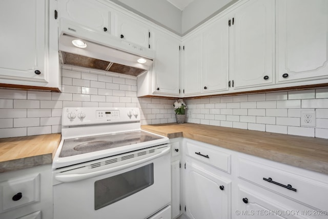 9553 W 71st St S, Tulsa, OK 74131 - kitchen with wood counters, under cabinet range hood, white cabinets, and electric stove