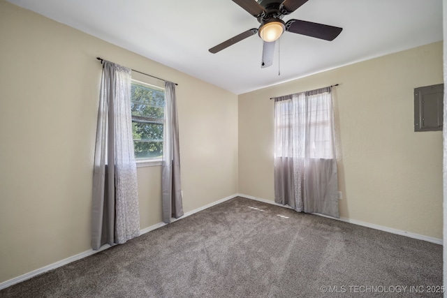 9553 W 71st St S, Tulsa, OK 74131 - unfurnished room featuring electric panel, baseboards, a ceiling fan, and carpet floors