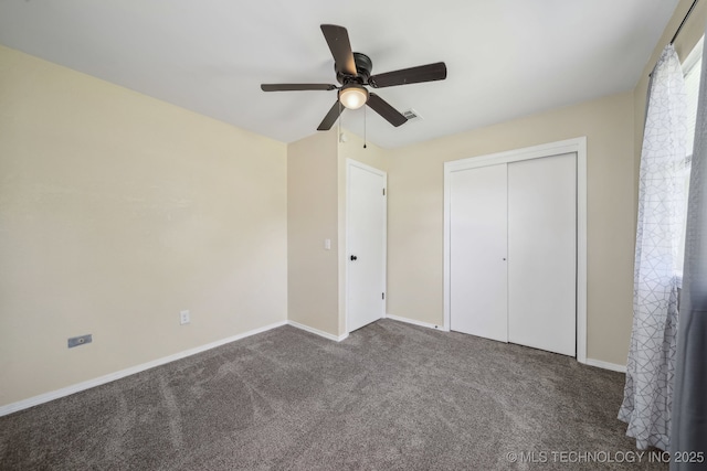 9553 W 71st St S, Tulsa, OK 74131 - unfurnished bedroom featuring carpet, a closet, baseboards, and ceiling fan
