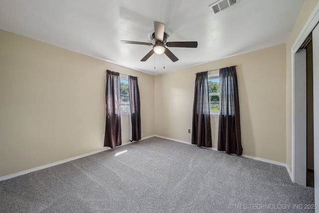 9553 W 71st St S, Tulsa, OK 74131 - carpeted empty room featuring baseboards, ceiling fan, and visible vents