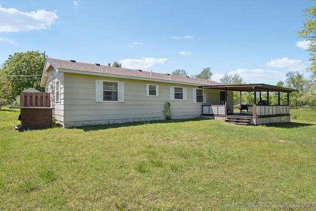 9553 W 71st St S, Tulsa, OK 74131 - rear view of house with a lawn