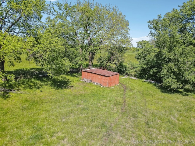 9553 W 71st St S, Tulsa, OK 74131 - view of yard with an outbuilding