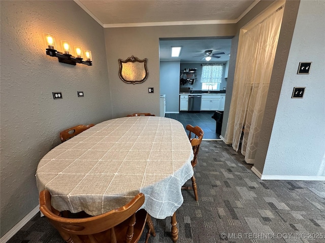 8815 Ashcroft Rd, Mounds, OK 74047 - dining room with ornamental molding, baseboards, dark carpet, and a textured wall