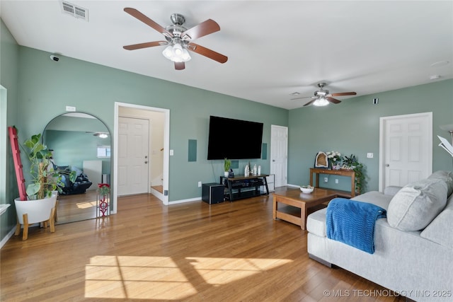 16550 S Elwood Ave, Glenpool, OK 74033 - living area with baseboards, ceiling fan, light wood-style flooring, and visible vents