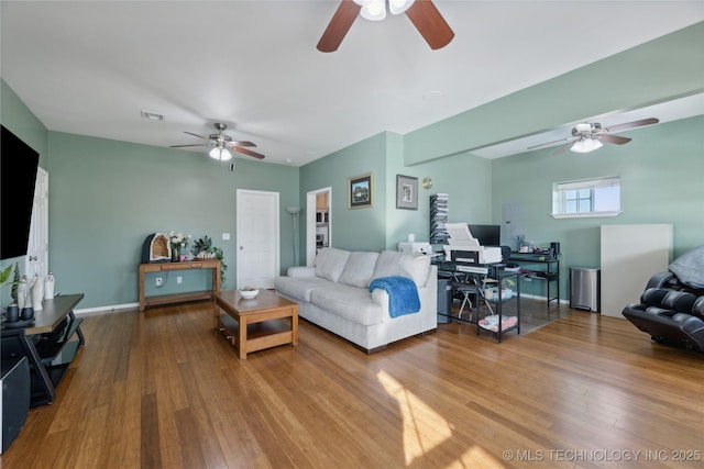 16550 S Elwood Ave, Glenpool, OK 74033 - living area with baseboards, a ceiling fan, visible vents, and wood finished floors