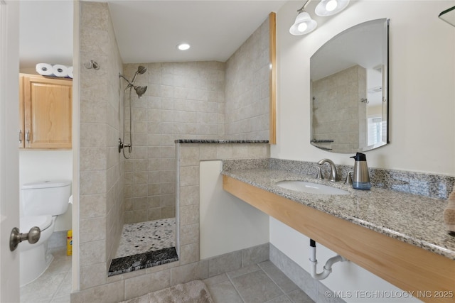 16550 S Elwood Ave, Glenpool, OK 74033 - full bath with a sink, walk in shower, toilet, and tile patterned floors