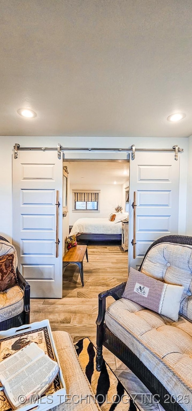interior space with recessed lighting and wood finished floors