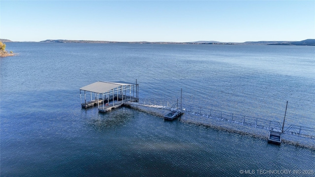 view of dock with a water view