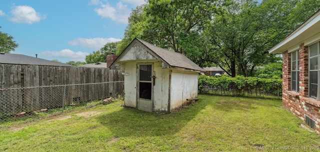 1117 W Chambers Ct, Claremore, OK 74017 - view of shed with a fenced backyard