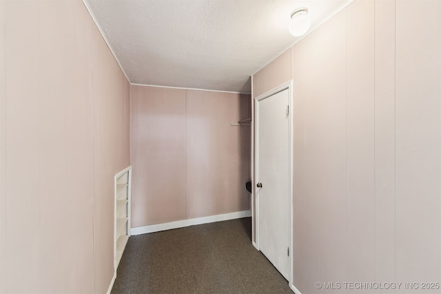 1117 W Chambers Ct, Claremore, OK 74017 - hall with a decorative wall and a textured ceiling