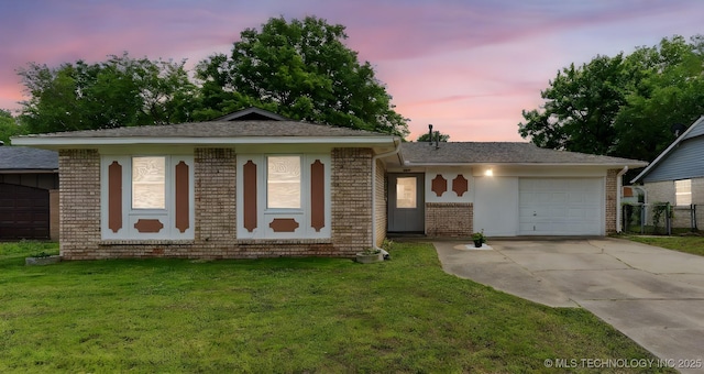 1117 W Chambers Ct, Claremore, OK 74017 - single story home with concrete driveway, brick siding, a garage, and a lawn