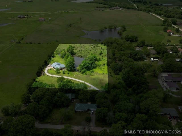 aerial view with a water view and a rural view