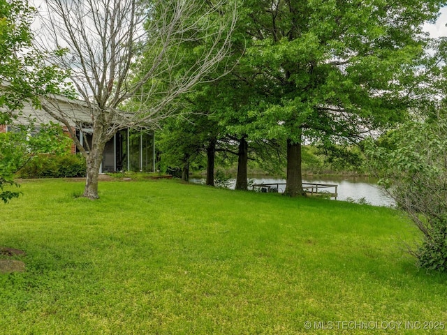 view of yard with a water view