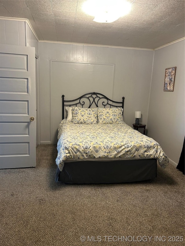 905 Leahy Ave, Pawhuska, OK 74056 - bedroom with ornamental molding and carpet floors