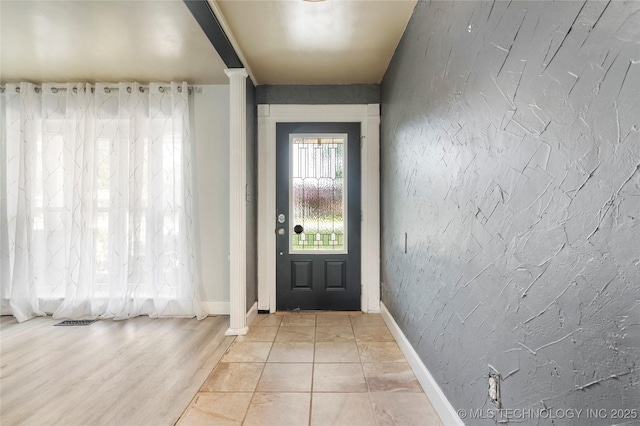 1022 W E St, Jenks, OK 74037 - foyer entrance featuring baseboards and ornate columns