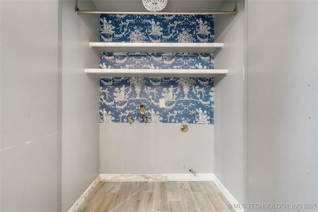 1022 W E St, Jenks, OK 74037 - laundry room with wood finished floors and baseboards