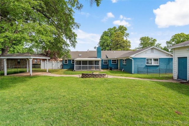 1022 W E St, Jenks, OK 74037 - back of house featuring a sunroom, a chimney, and brick siding