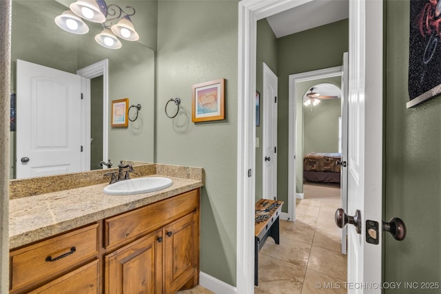 2501 Forest Ridge Parkway, Claremore, OK 74017 - ensuite bathroom featuring tile patterned floors, vanity, and baseboards