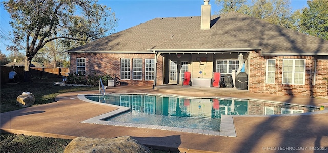 2501 Forest Ridge Parkway, Claremore, OK 74017 - outdoor pool featuring a patio area and a fenced backyard