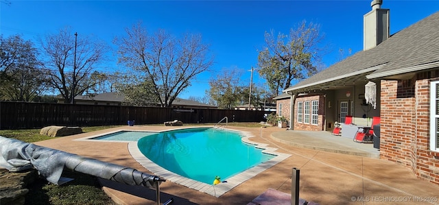2501 Forest Ridge Parkway, Claremore, OK 74017 - view of swimming pool with a patio and a fenced backyard