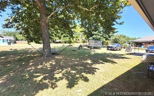 1607 Kay, Durant, OK 74701 - view of yard with a trampoline