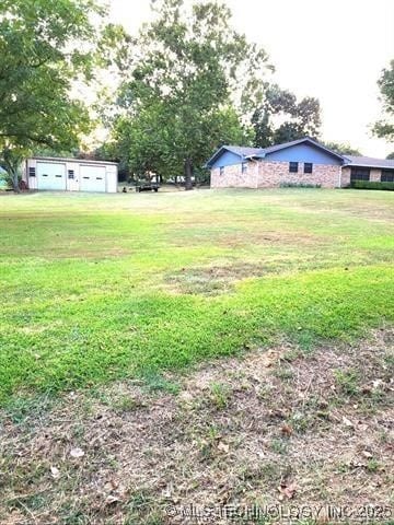 1607 Kay, Durant, OK 74701 - view of grassy yard