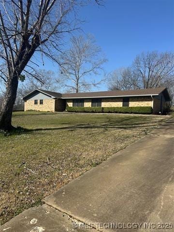 1607 Kay, Durant, OK 74701 - ranch-style home featuring a front yard