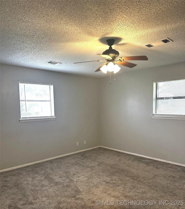 1607 Kay, Durant, OK 74701 - unfurnished room with ceiling fan, carpet flooring, a textured ceiling, and baseboards