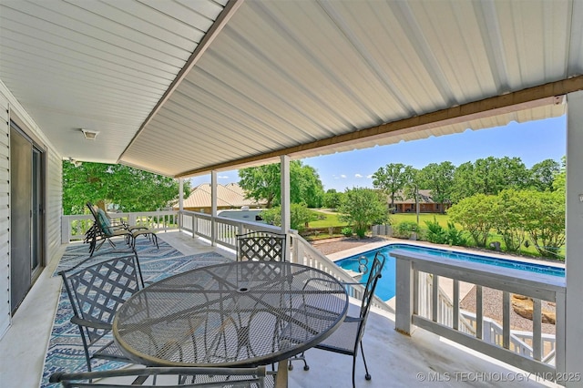 7626 Whispering Way, Kingston, OK 73439 - view of patio with outdoor dining area and a fenced in pool