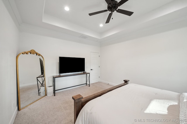 bedroom with recessed lighting, ceiling fan, carpet flooring, a raised ceiling, and baseboards