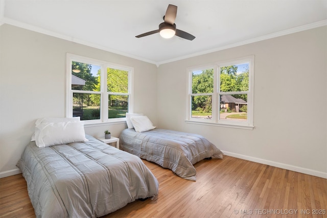 487 S Allegheny Ave, Tulsa, OK 74112 - bedroom with ornamental molding, baseboards, and wood finished floors