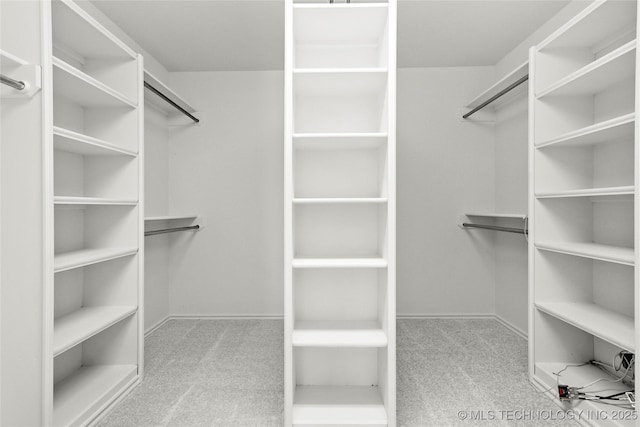 9624 S 68th E Ave, Tulsa, OK 74133 - spacious closet featuring carpet floors