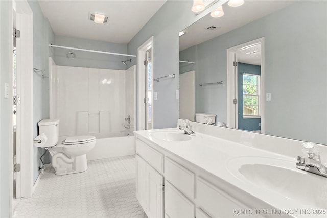 9624 S 68th E Ave, Tulsa, OK 74133 - bathroom featuring toilet, bathtub / shower combination, visible vents, and a sink