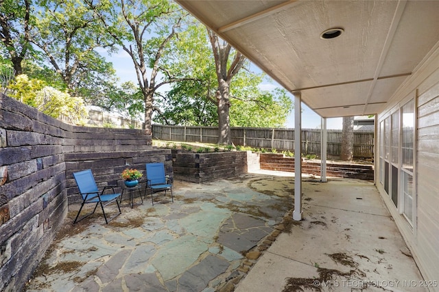 9624 S 68th E Ave, Tulsa, OK 74133 - view of patio / terrace with a fenced backyard
