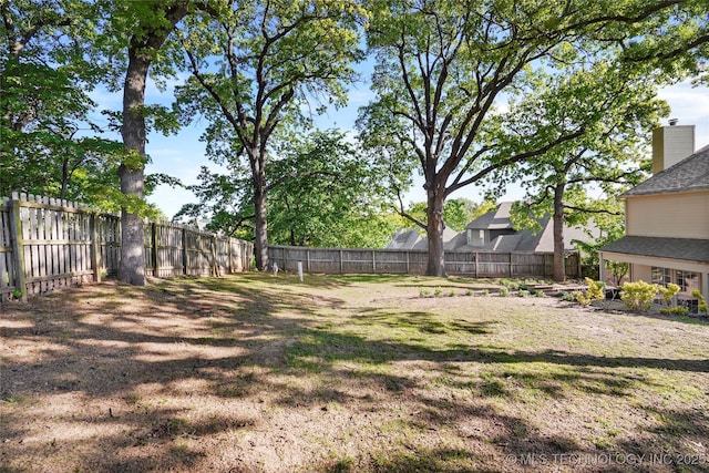 9624 S 68th E Ave, Tulsa, OK 74133 - view of yard with a fenced backyard
