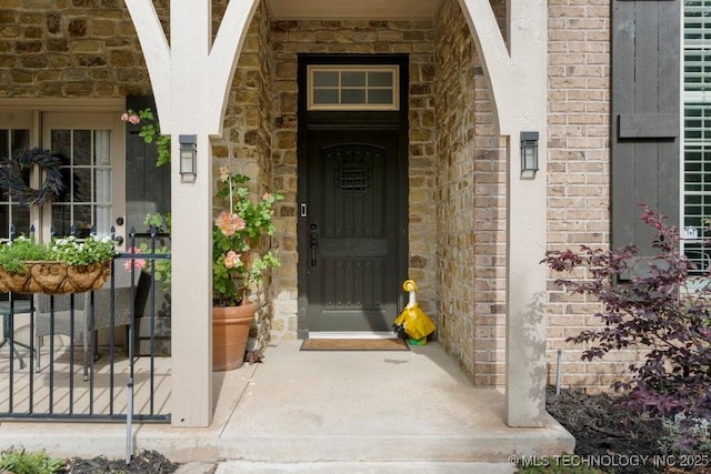 6811 S Sycamore Pl, Broken Arrow, OK 74011 - entrance to property featuring stone siding
