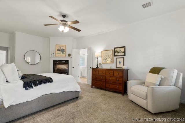 6811 S Sycamore Pl, Broken Arrow, OK 74011 - bedroom featuring crown molding, carpet flooring, ensuite bath, and a ceiling fan