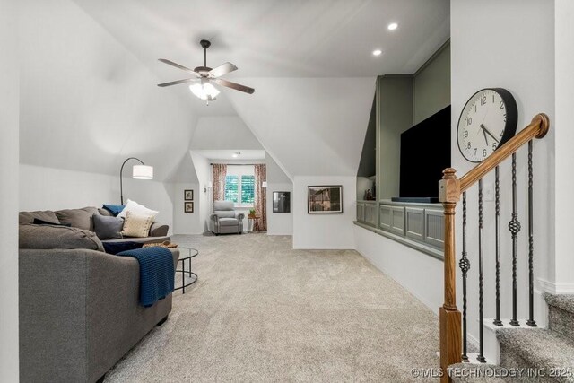 6811 S Sycamore Pl, Broken Arrow, OK 74011 - carpeted living room featuring lofted ceiling, ceiling fan, stairway, and recessed lighting
