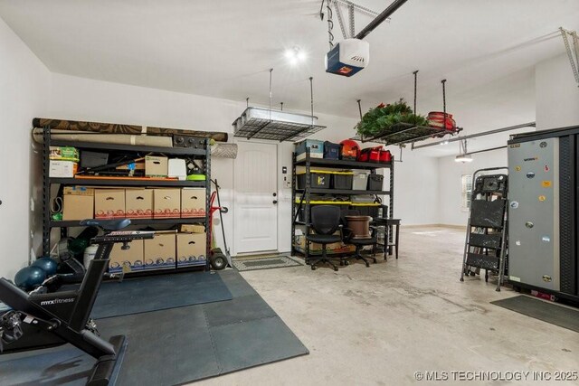 6811 S Sycamore Pl, Broken Arrow, OK 74011 - garage featuring a garage door opener