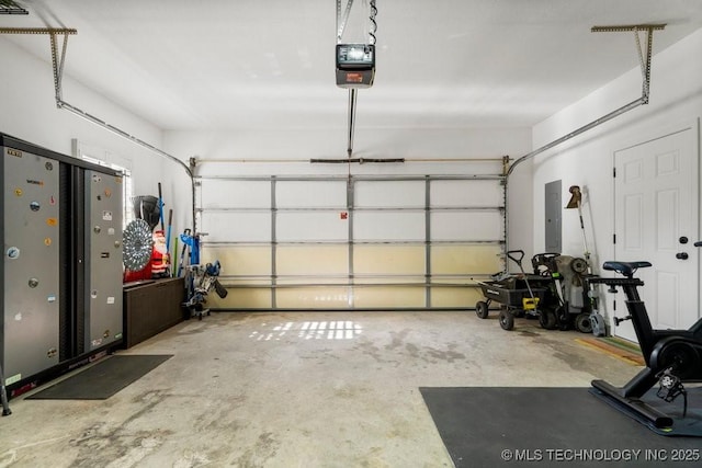 6811 S Sycamore Pl, Broken Arrow, OK 74011 - garage featuring electric panel and a garage door opener