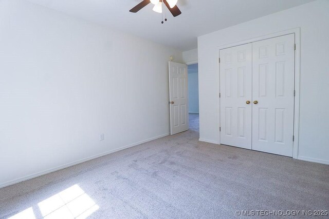 3934 S 199th E Ave, Broken Arrow, OK 74014 - unfurnished bedroom featuring carpet floors, a closet, and a ceiling fan