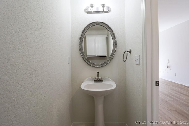 3934 S 199th E Ave, Broken Arrow, OK 74014 - bathroom with a textured wall and wood finished floors