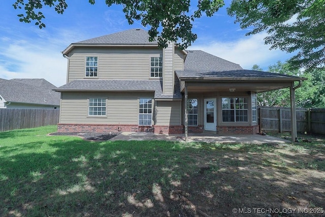 3934 S 199th E Ave, Broken Arrow, OK 74014 - back of house with a fenced backyard, a patio area, and roof with shingles