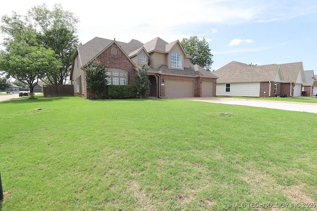 3934 S 199th E Ave, Broken Arrow, OK 74014 - traditional home featuring brick siding, concrete driveway, a front lawn, and an attached garage