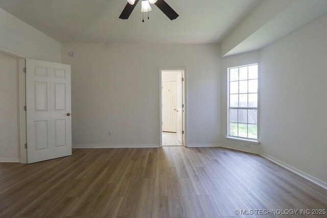 3934 S 199th E Ave, Broken Arrow, OK 74014 - unfurnished room with healthy amount of natural light, ceiling fan, and wood finished floors