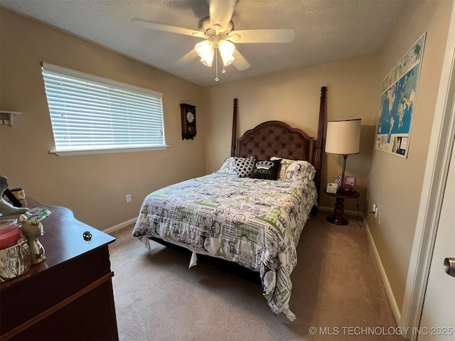105 Hinton Blvd, Mannford, OK 74044 - carpeted bedroom featuring baseboards, ceiling fan, and a textured ceiling