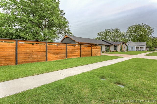402 W Detroit St, Broken Arrow, OK 74012 - view of yard featuring driveway and fence