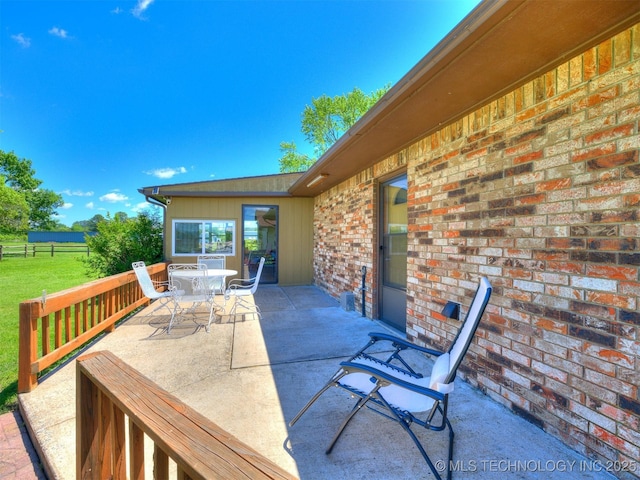 view of patio / terrace with fence and outdoor dining space