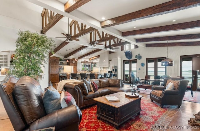 9639 Horizon Cir, Sperry, OK 74073 - living room with a ceiling fan and lofted ceiling with beams